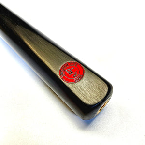 Close-up of Premium Cues ICON No.009 butt with red logo badge, showcasing craftsmanship and authenticity for snooker enthusiasts.