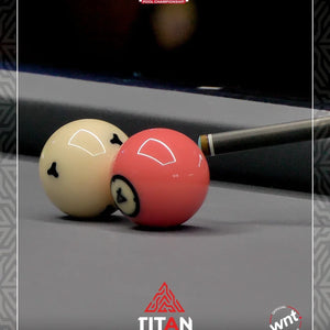 Two pool balls on a pool table with 'Matchroom UK Open' and 'Titan Dynalspheres' branding.