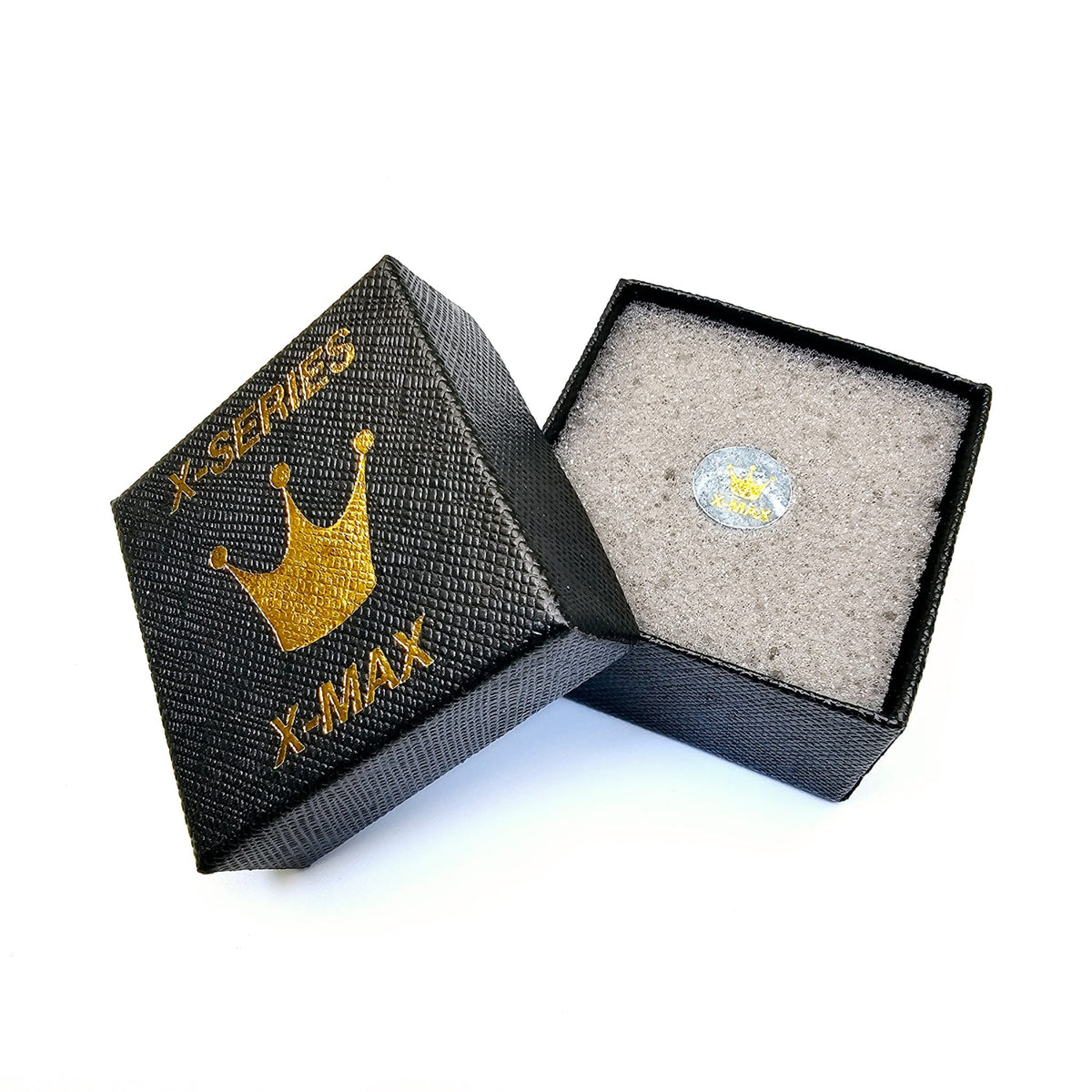 Two snooker cue tips placed inside an open black box with 'X-MAX' and a crown symbol on it, against a white background.