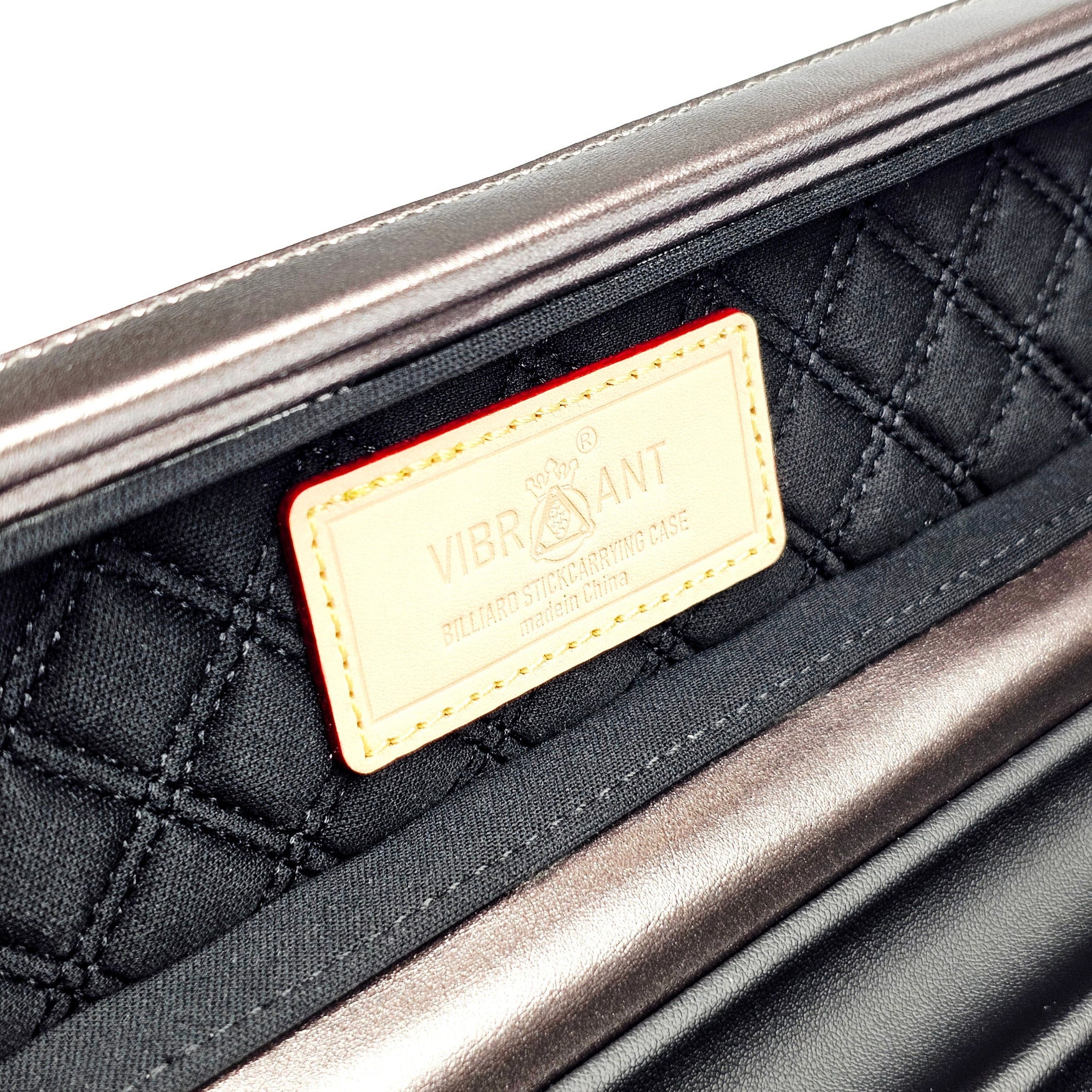 Vibrant Carbon Orange One Piece Cue Case - Interior Vibrant Logo close up view