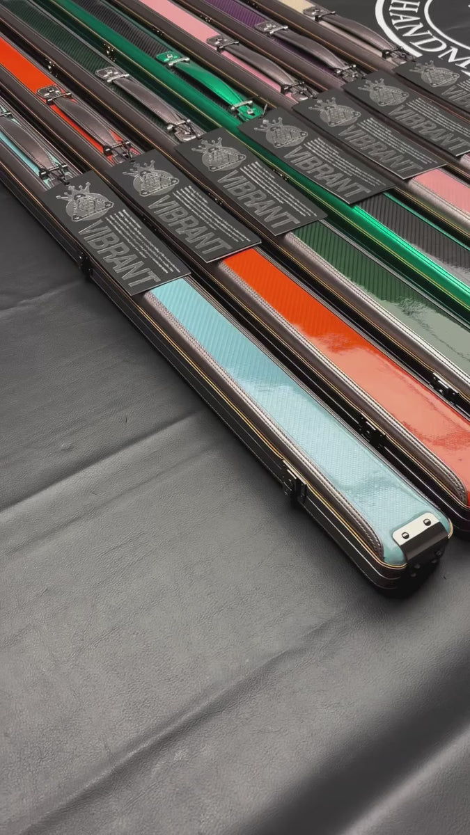 A selection of Vibrant Carbon 2 channel cue cases