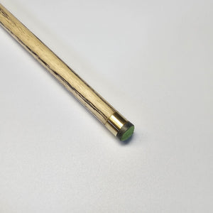 Tip close-up of Premium Cues ICON No.005 - One Piece Snooker Cue featuring brass ferrule and green cue tip for enhanced shot control.