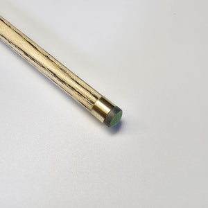 Tip close-up of Premium Cues ICON No.011 - One Piece Snooker Cue with brass ferrule and green tip for precise cue ball contact.