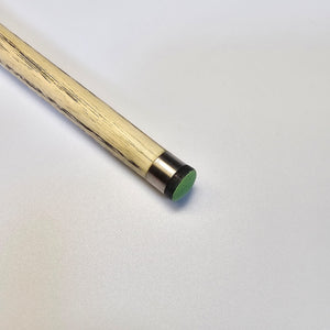 Close-up of Premium Cues ICON No.009 cue tip with green chalked tip and metal ferrule, built for precision snooker shots.