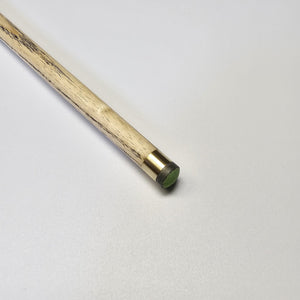 Close-up of Premium Cues ICON No.003 snooker cue tip with 9.5mm green tip and brass ferrule for accurate cue ball control.