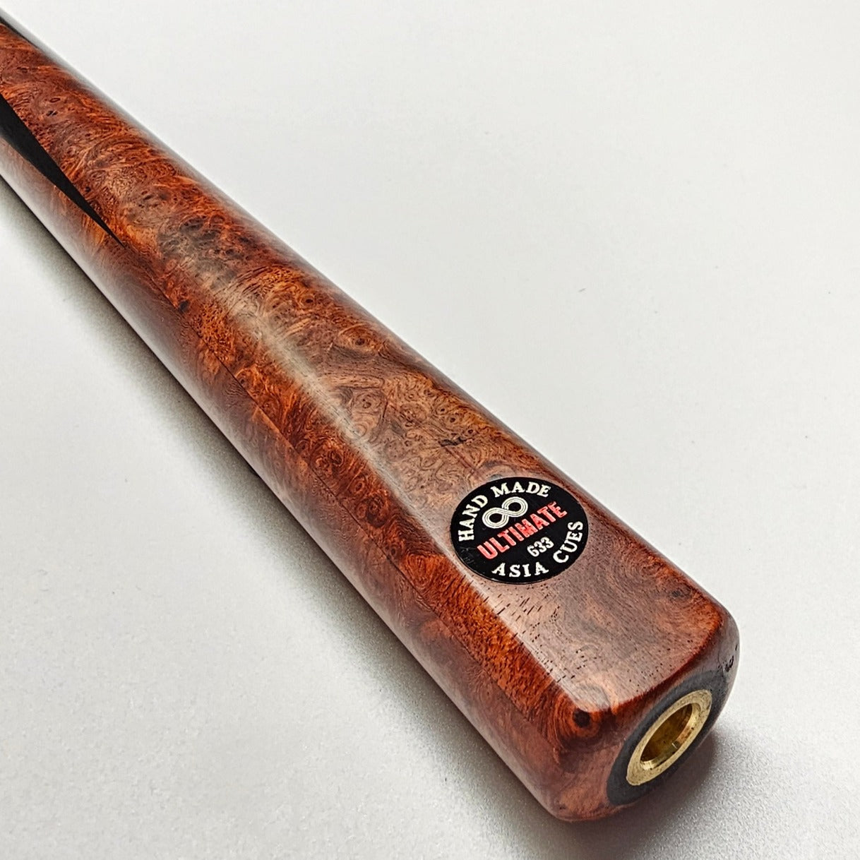 Asia Cues Ultimate No.633 - One Piece Snooker Cue  Handmade Ebony Butt with 4 lower splices of Burl wood. Badge View
