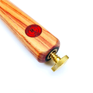 Close-up of Brass Cue Butt Protector partially screwed into a Premium Cues cue. Precision threading ensures a snug, protective fit.