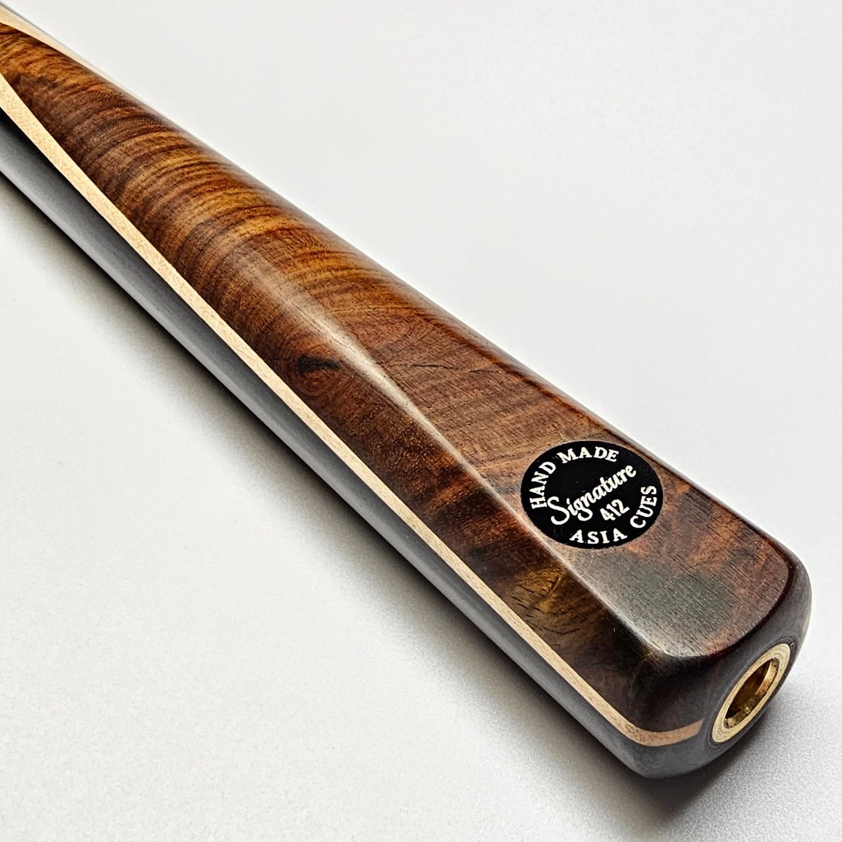 Asia Cues Signature One Piece Snooker Cue  Handmade Ebony Butt with Front splice of Siam Rosewood and Thick Maple Veneer. Badge view