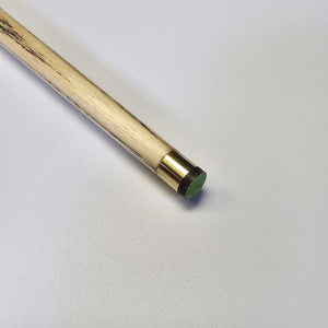 Tip close-up of Premium Cues ICON No.007 - One Piece Snooker Cue with brass ferrule and green tip for optimal cue ball contact.