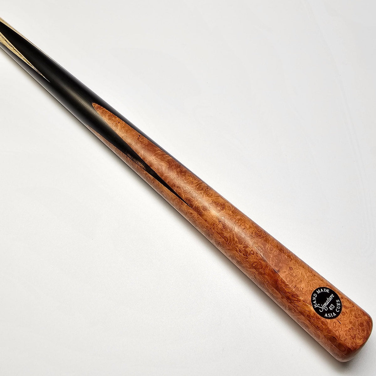 Asia Cues Signature One Piece Pool Cue  Handmade Ebony Butt with 4 lower splices of Amboyna Burl. Butt View