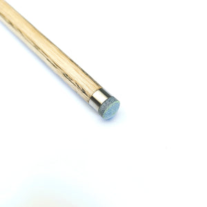 Close-up of Premium Cues ICON No.016 cue tip with titanium ferrule and blue tip, engineered for accurate snooker shots.