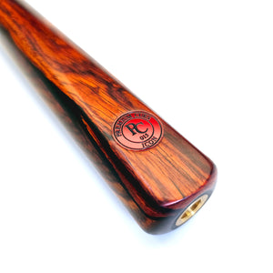Close-up of Premium Cues ICON No.015 butt featuring PC ICON 015 badge and threaded extension insert, highlighting cocobolo wood detail.