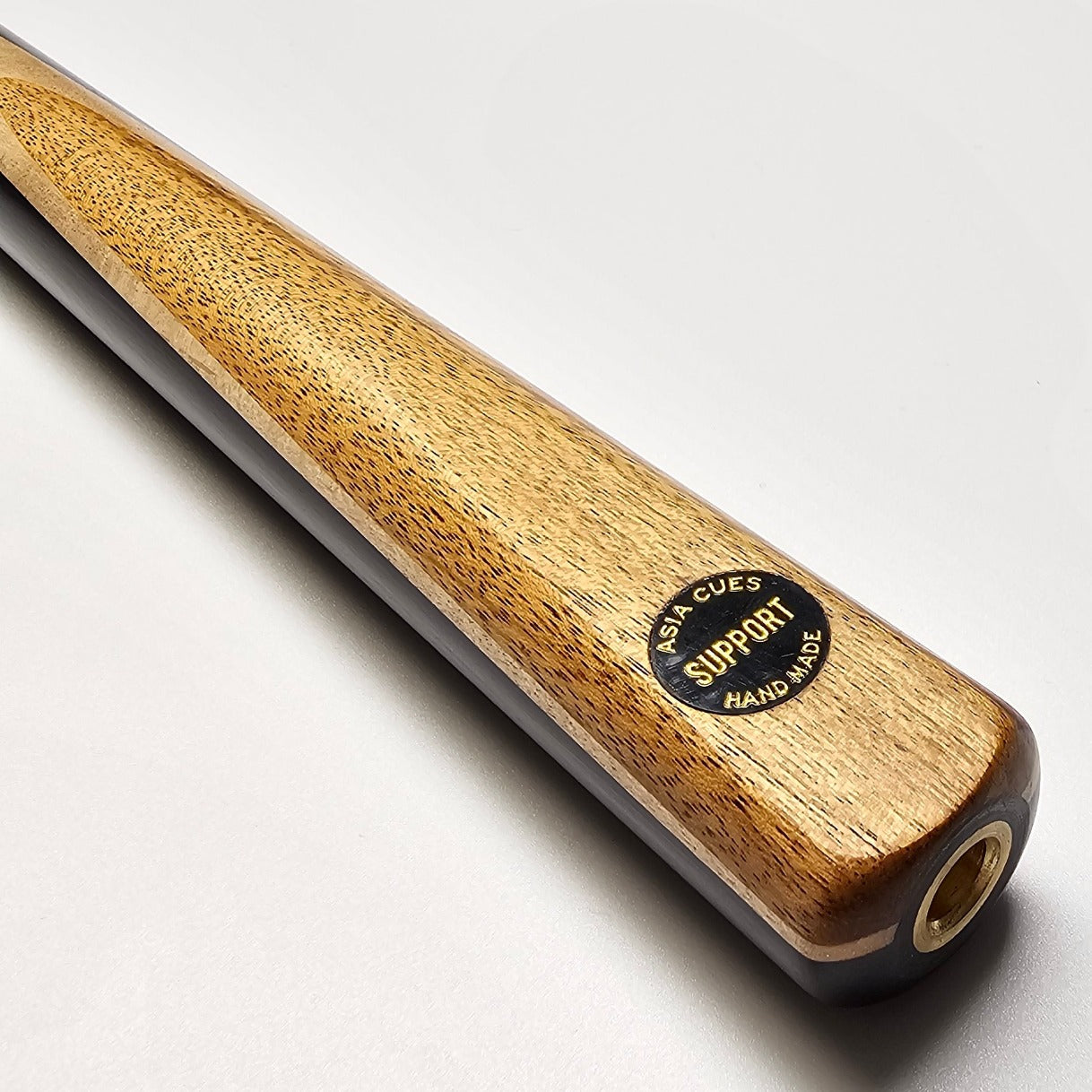 Asia Cues Support - One Piece Snooker Cue  Handmade Ebony Butt with Ovangkol front splice and Thick Birdseye Maple Veneer Full Shaft Ash Cue. Badge View